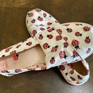 TOMS ladybug slide on shoes